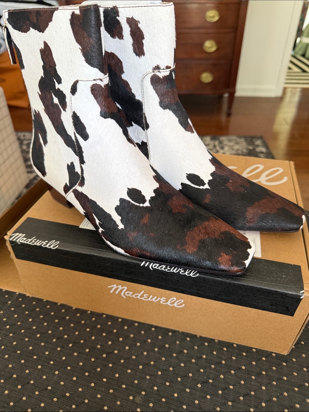 Madewell Cow-Pattern Pointed Ankle Booties in White and Brown